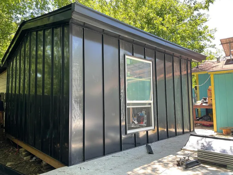 Black standing seam metal wall panels for Roof Inspection in Shelley