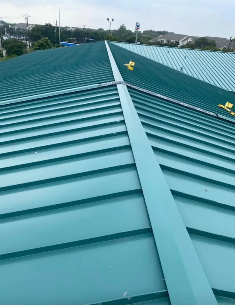 Green commercial metal roof ridge and valley for Metal Roof Repair in Shelley