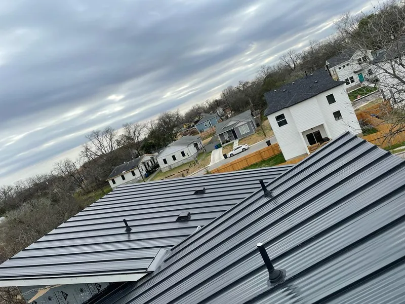 Standing seam metal roof panels with vents for Skylight Repair in Shelley